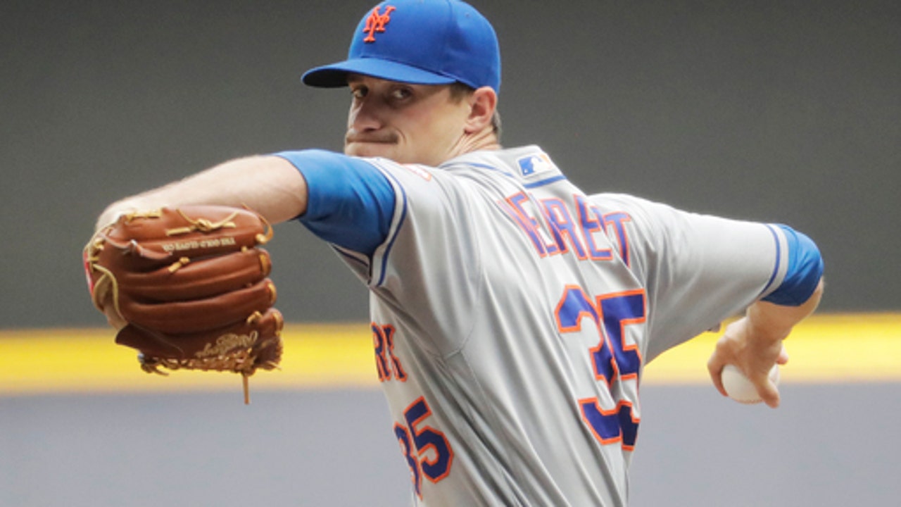 Walker leaves with back injury in Mets' loss to Brewers